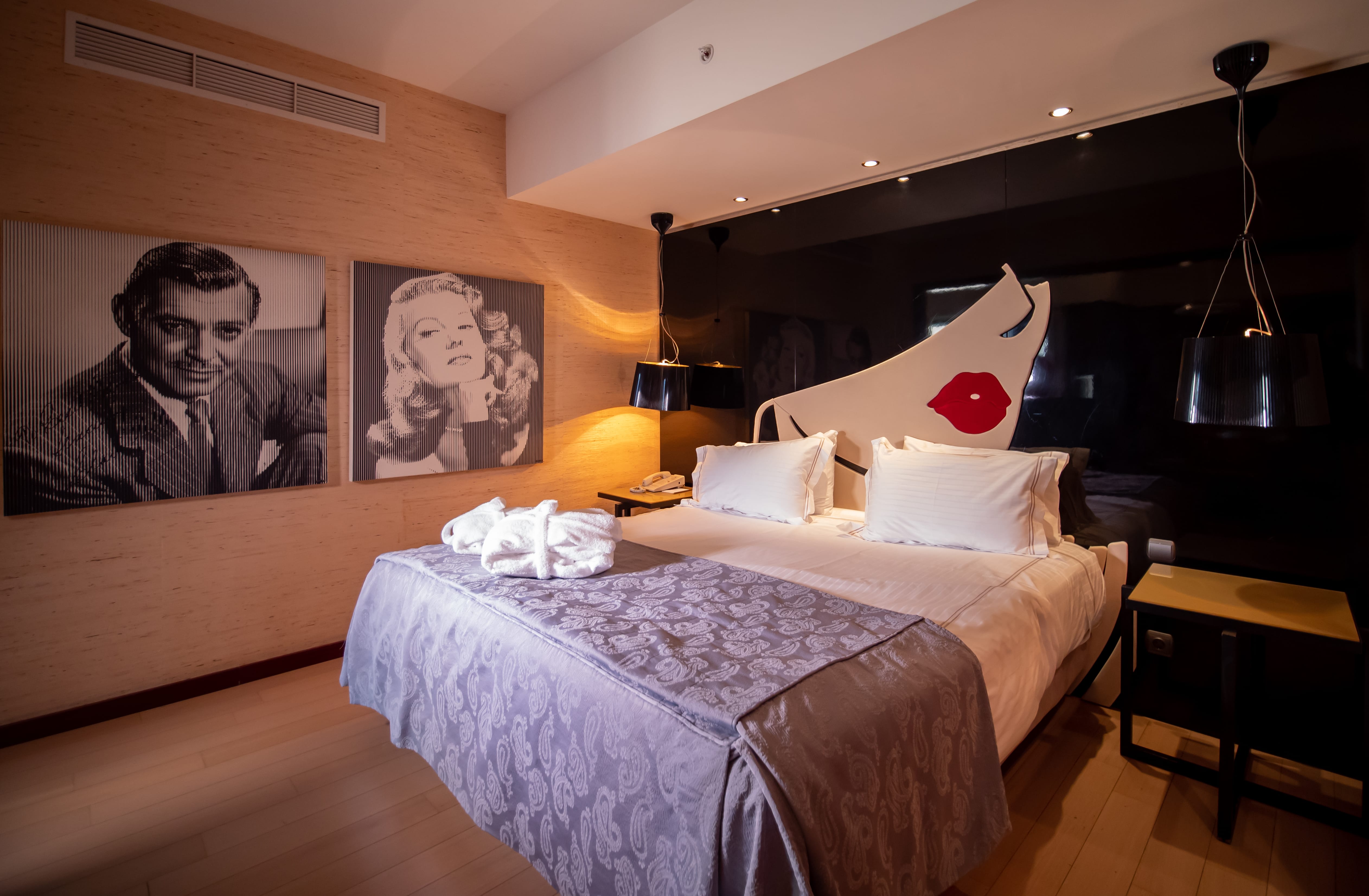 a hotel room with two beds