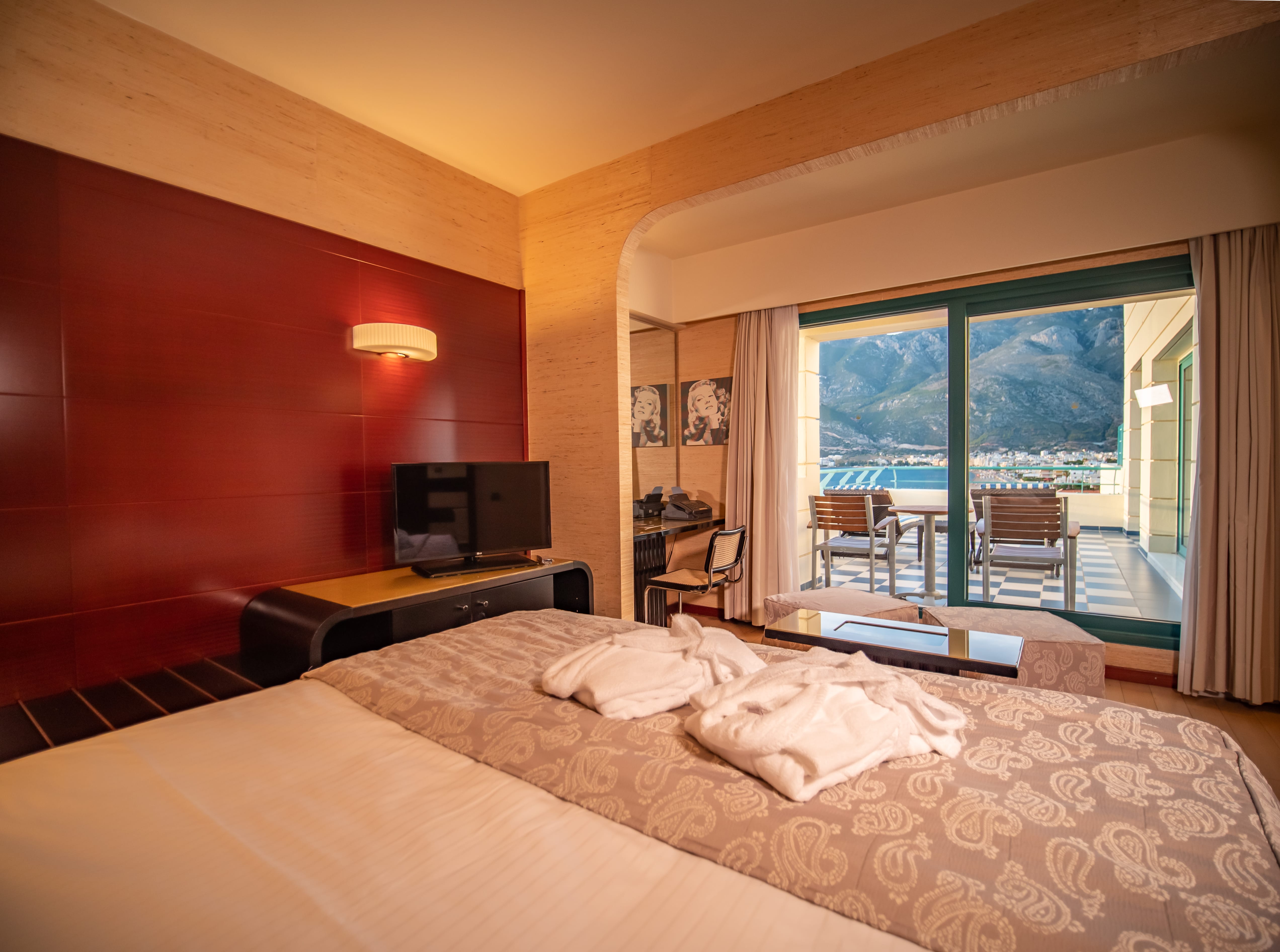 a hotel room with a large window