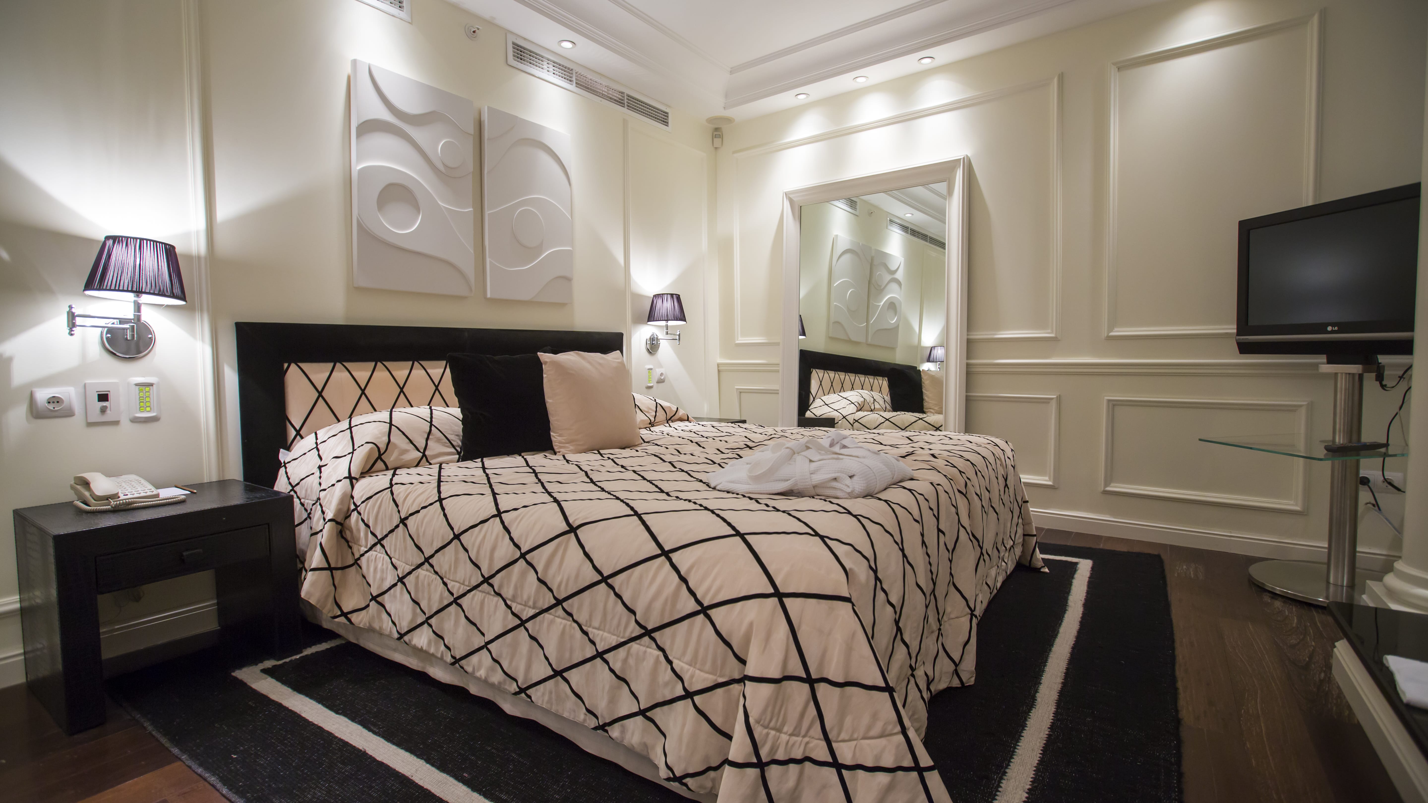 a bedroom with a large bed