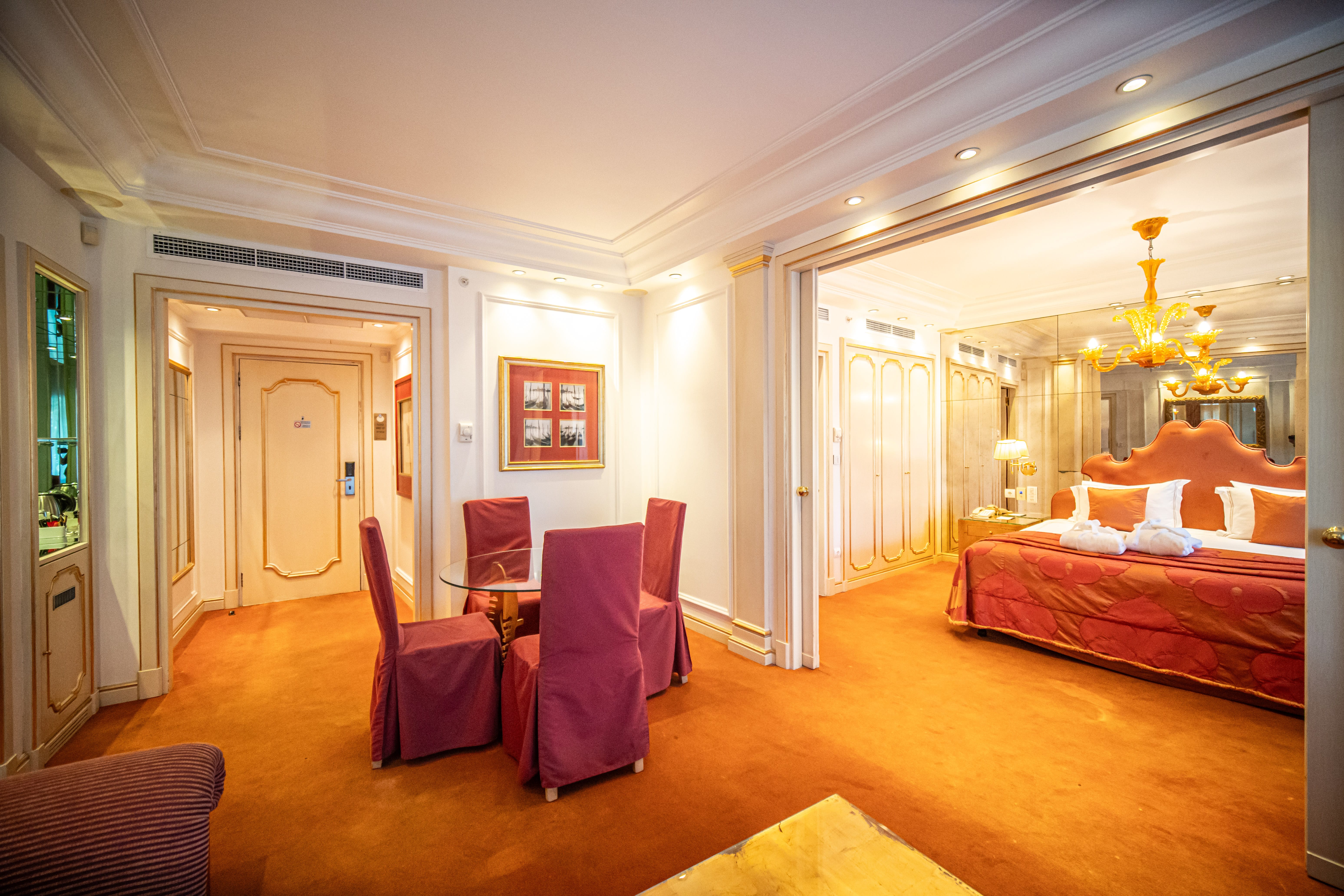 a bedroom with a large mirror